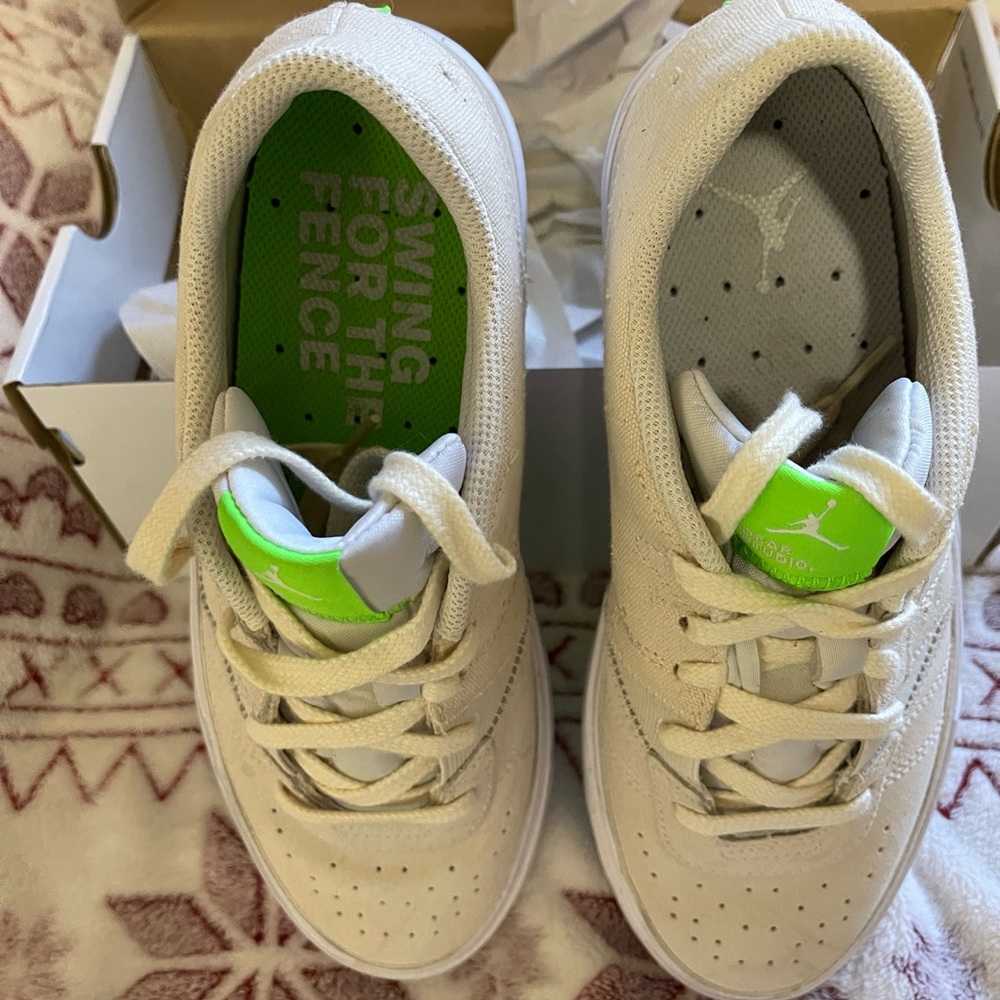 Women’s Nike Air Jordans Lo Top.  Worn once. Size 9M.